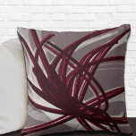 Gray and Burgundy Artistic Abstract Ribbons Cushion<br><div class="desc">Gray and burgundy throw pillow features an artistic abstract ribbon composition with shades of burgundy and grey with white accents on a gray background. This abstract composition is built on combinations of repeated ribbons, which are overlapped and interlaced to form an intricate and complex abstract pattern. The gray, burgundy, white...</div>