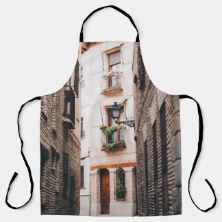 GRAY CONCRETE ALLEY DURING DAYTIME APRON