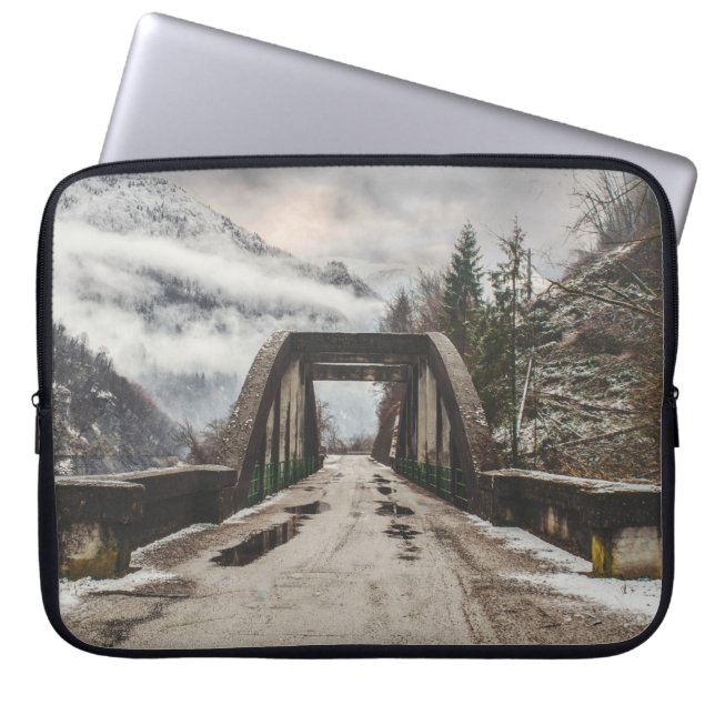 GRAY CONCRETE ARCH BRIDE BESIDE LEAFLESS TREE NEAR LAPTOP SLEEVE (Front)