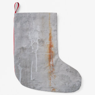 Gray concrete wall small christmas stocking