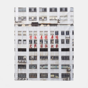 GRAY MULTISTORY BUILDING WITH RED ORIENTAL SCRIPT FLEECE BLANKET