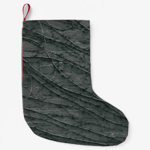 Gray painted brick wall small christmas stocking