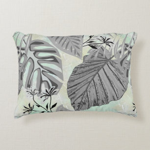 Gray tropical leaves and flowers. decorative cushion