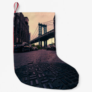 GRAY VEHICLE AT ROAD BESIDE CONCRETE BUILDING SMALL CHRISTMAS STOCKING