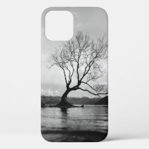 GRAYSCALE PHOTO OF BARE TREE ON CALM BODY OF WATER iPhone 12 CASE