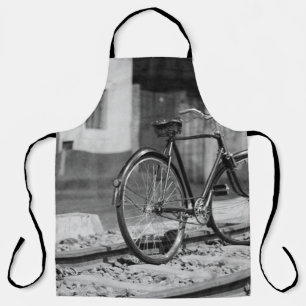 GRAYSCALE PHOTO OF COMMUTER BIKE APRON