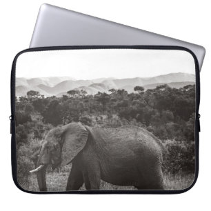 GRAYSCALE PHOTO OF GRAY ELEPHANT NEAR TREES LAPTOP SLEEVE
