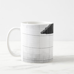 GRAYSCALE PHOTO OF MAN WALKING ON CONCRETE PAVEMEN COFFEE MUG
