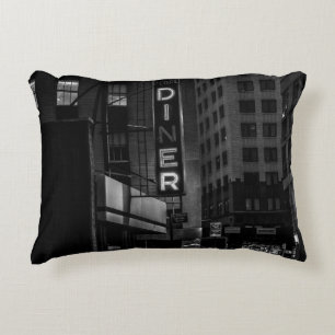 GRAYSCALE PHOTO OF PEARL DINER SIGN IN CITY DECORATIVE CUSHION