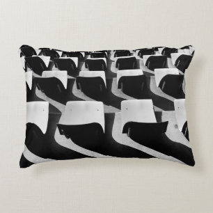 Grayscale photography of chairs with no people decorative cushion
