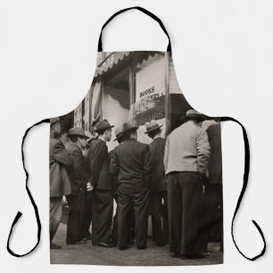 GRAYSCALE PHOTOGRAPHY OF MEN STANDING NEAR HOUSE APRON