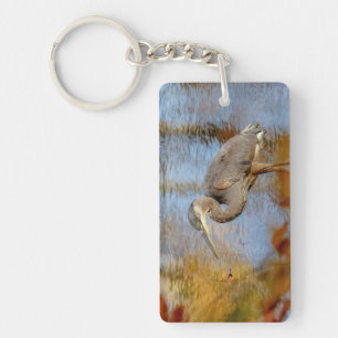 Great Blue Heron framed with fall foliage Key Ring