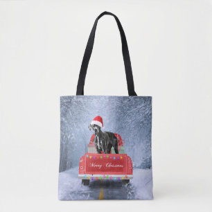 Great dane Dog in Snow sitting in Christmas Truck Tote Bag