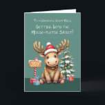 Great Niece Adorable Funny Moose Christmas Card<br><div class="desc">This charming Christmas card for your great-niece captures the magic of the season with a playful twist! A darling moose, tangled in colourful Christmas lights, sits by a snow-dusted tree with presents beneath its branches. A candy cane-pole sign reading "Joy" adds to the whimsy. The festive design, paired with the...</div>