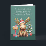 Great Niece Adorable Funny Moose Christmas Card<br><div class="desc">This charming Christmas card for your great-niece captures the magic of the season with a playful twist! A darling moose, tangled in colourful Christmas lights, sits by a snow-dusted tree with presents beneath its branches. A candy cane-pole sign reading "Joy" adds to the whimsy. The festive design, paired with the...</div>