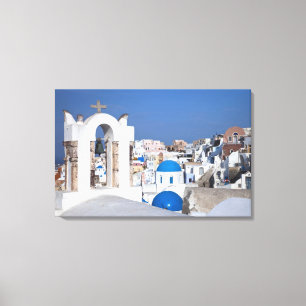 Greece, Santorini. Bell tower and blue domes of 2 Canvas Print