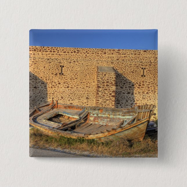 Greece, Santorini, Oia. Old fishing boat on dry 15 Cm Square Badge (Front)