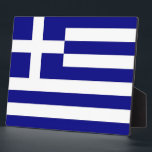 Greek Flag Plaque<br><div class="desc">Add a touch of Greek heritage to your space with our elegant plaque featuring the flag of Greece! Crafted with meticulous attention to detail, this plaque proudly showcases the iconic flag of Greece. The flag features nine horizontal stripes of blue and white, with a blue canton bearing a white cross...</div>