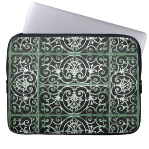 Green and black scrollwork pattern laptop sleeve