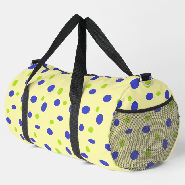 Green and blue dots on yellow duffle bag (Right Corner)