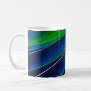 Green and blue feather close-up photography coffee mug