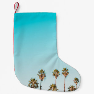 GREEN-AND-BROWN PALM TREES UNDER CLEAR BLUE SKY SMALL CHRISTMAS STOCKING
