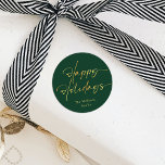 Green and Gold Christmas Classic Round Sticker<br><div class="desc">This is a simple holiday sticker using an elegant handwritten script font in gold and festive dark green. This is would suit anyone looking for gift wrapping supplies that are both modern, minimal in style and contemporary. Please contact the designer for any queries regarding this design or for any matching...</div>