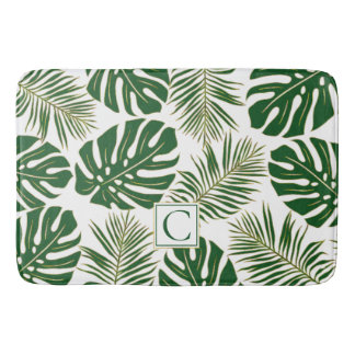Green and gold tropical leaves and monogram bath mat