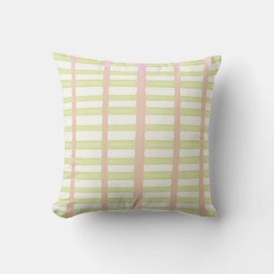 Green and pink watercolor stripes on white cushion