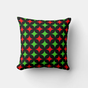 Green and Red Star Pattern on Black Cushion