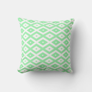 Green and white diamond pattern cushion