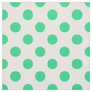 Green and white polka dots fabric