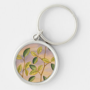 Green and Yellow Leaves on Sunset Background Key Ring