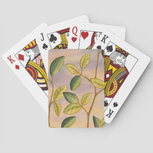 Green and Yellow Leaves on Sunset Background Playing Cards