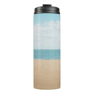 Green artificial palm tree on seashore thermal tumbler