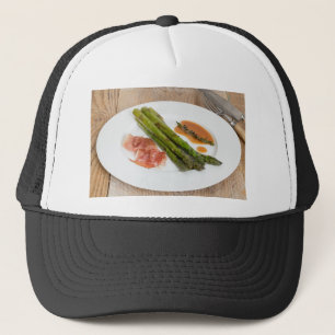 Green asparagus with ham and sauce trucker hat
