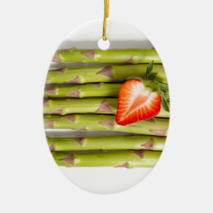 Green asparagus with strawberries top view ceramic tree decoration