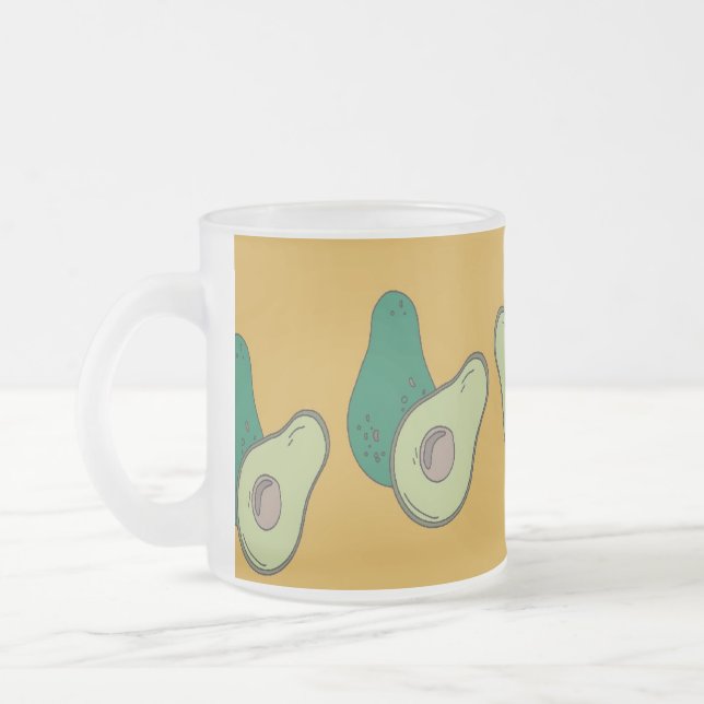 Green avocado on brown frosted glass coffee mug (Left)