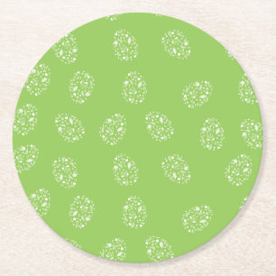 Green background with ornamental eggs round paper coaster