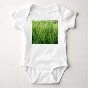 Green barley field, spring closeup. baby bodysuit