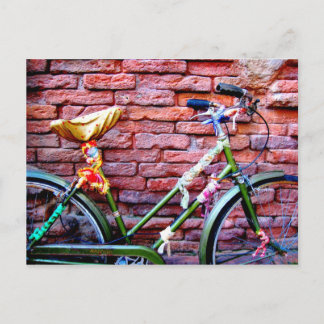 Green Bicycle Leaning Against a Brick Wall Postcard