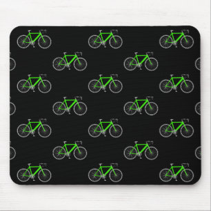 green bicycle on black mouse mat