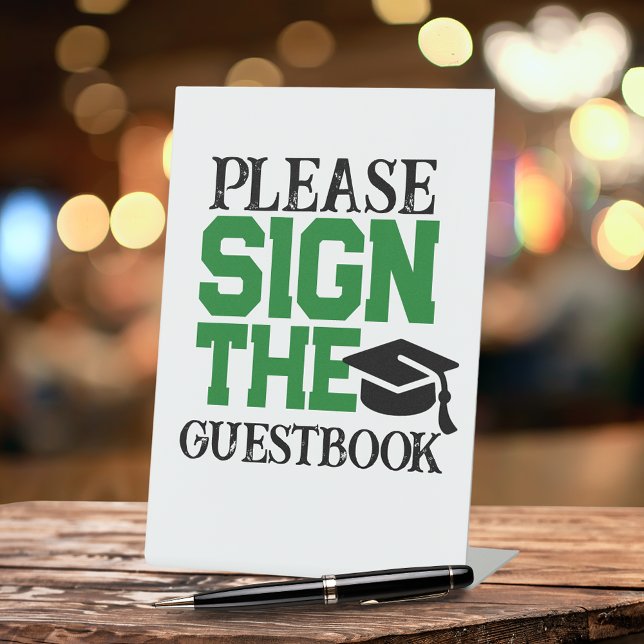 Green, Black & White Guestbook Graduation Table Pedestal Sign (Green and Black Graduation Cap Guestbook Pedestal Table Sign)