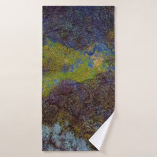Green, blue, and brown mat bath towel