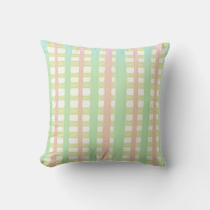 Green blue and pink watercolor stripes on white cushion