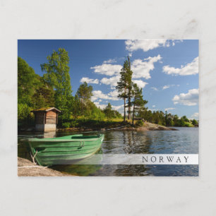 Green boat in a fjord in Norway bar postcard