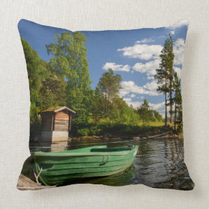 Green boat in a fjord in Norway Cushion