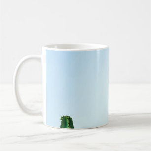 Green cactus plant in white background coffee mug