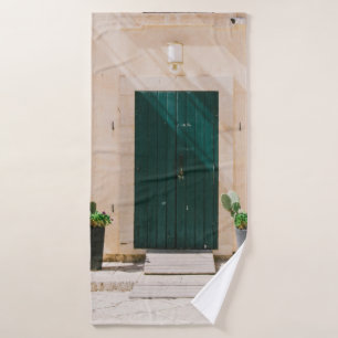 GREEN CACTUS PLANT NEAR GREEN DOOR BATH TOWEL