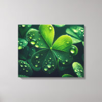 Green clover leaves with water droplets -